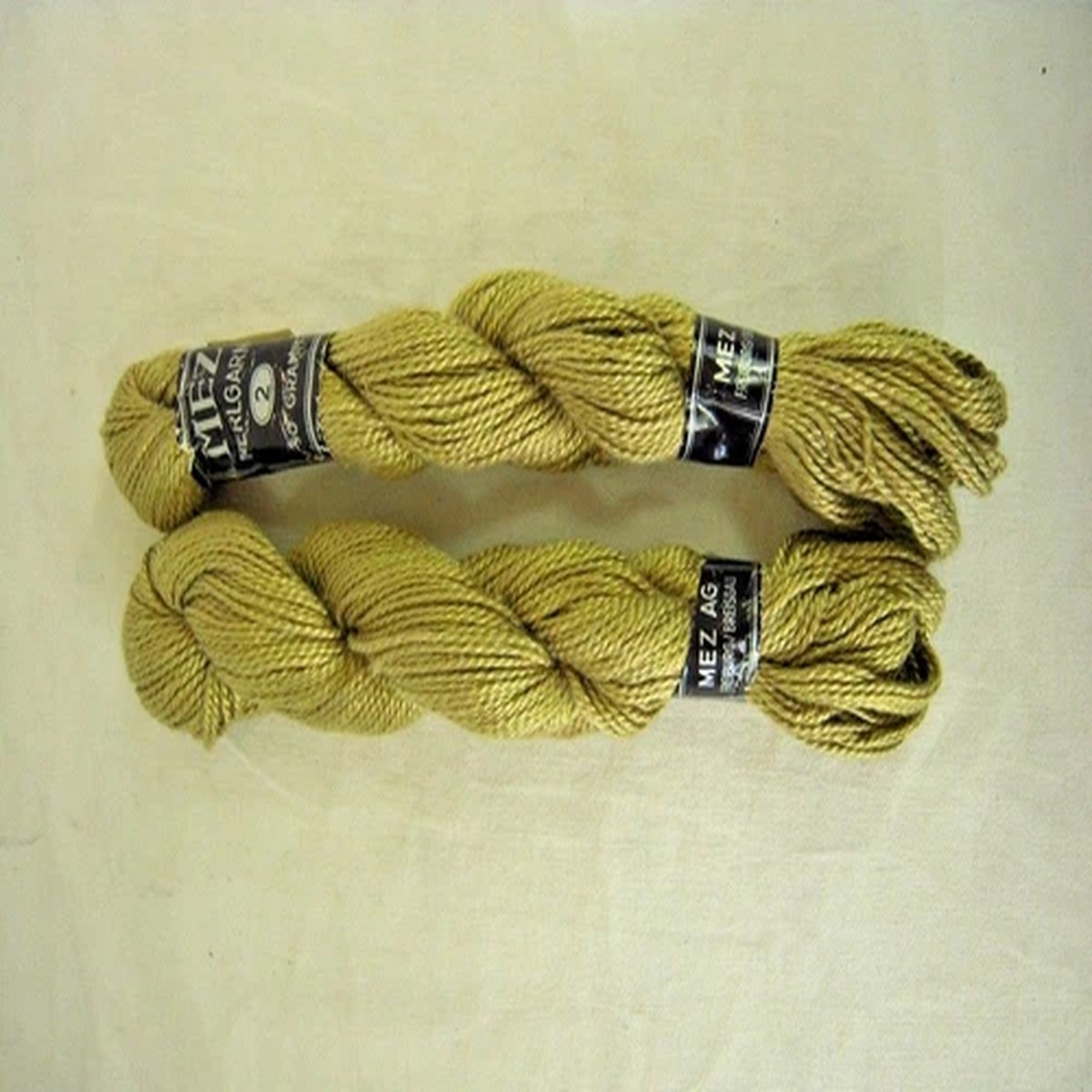 MEZ AG Freiburg / Breisgau Perlgarn – 50 g – color# 854 greenish gold – 2 skeins